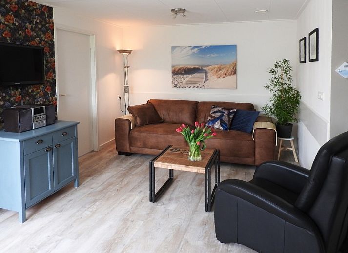 Familie Smit bungalow in Den Burg Texel met kleurrijke tuin en bloemenpracht.