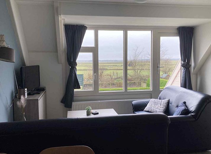 Kinderfreundlicher Garten mit Trampolin im NH197-Ferienhaus Den Burg Texel