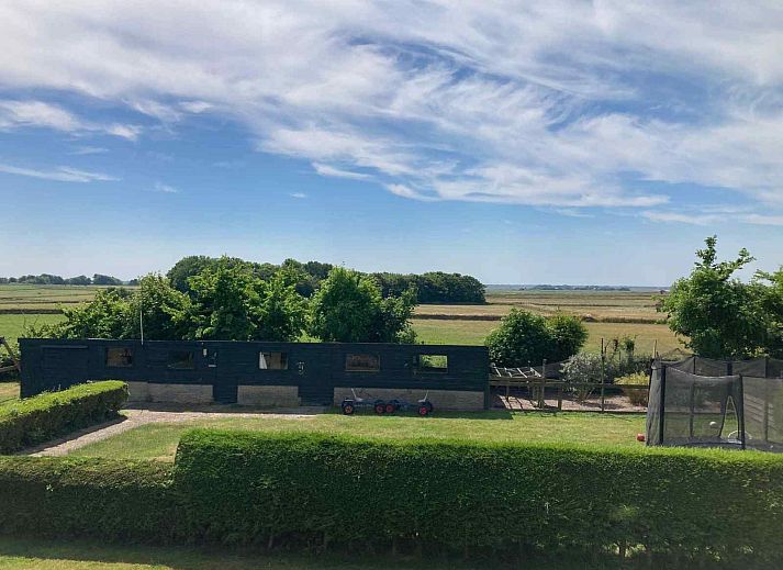 Atemberaubender Sonnenuntergang vom NH197-Ferienhaus Den Burg Texel aus gesehen