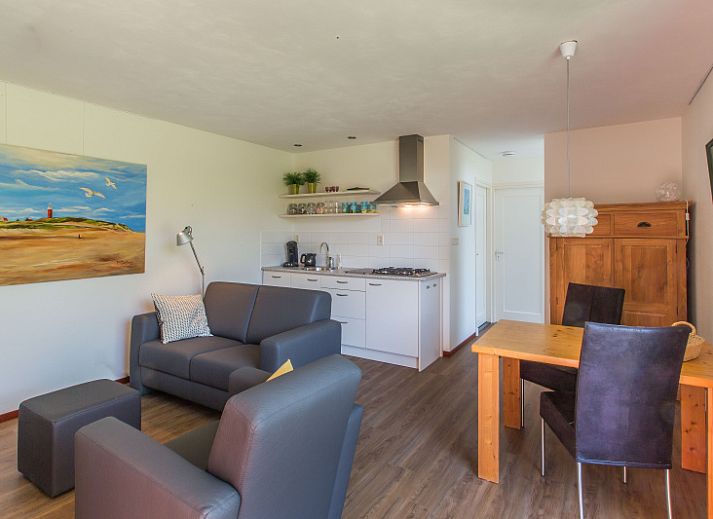 Slingerhuusie vakantiehuis in Den Burg Texel met zonnig terras en groene tuin