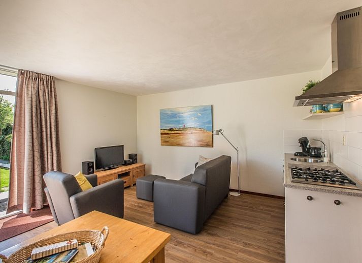 Slingerhuusie vakantiehuis in Den Burg Texel met zonnig terras en groene tuin