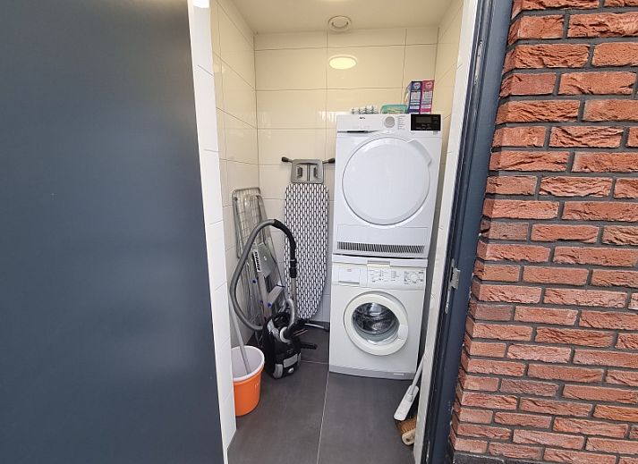 Modern kitchen and living room in Schoonoordsingel 29a, vacation home in Den Burg, Texel.