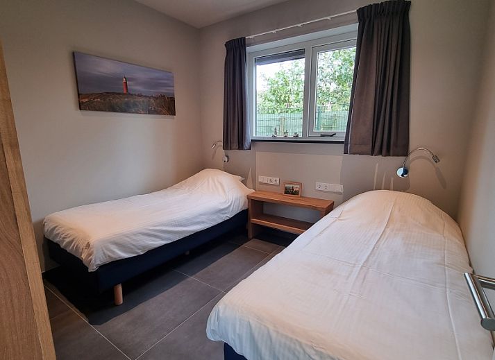 Modern kitchen and living room in Schoonoordsingel 29a, vacation home in Den Burg, Texel.