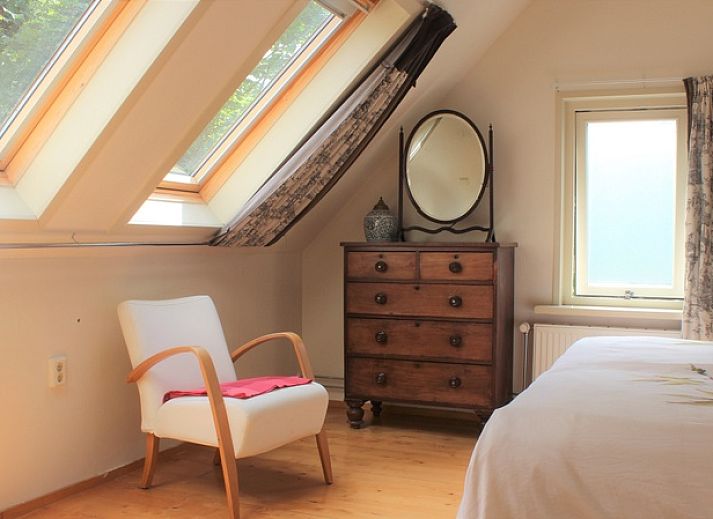 Gemuetliche Kueche des Ferienhauses Het Achterhuys in Den Burg, Texel mit Essecke.