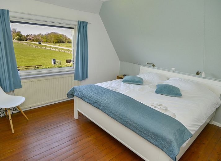 Bungalow Het Lam in Den Burg, Texel with spacious garden and terrace, ideal for relaxation on the Wadden Islands.