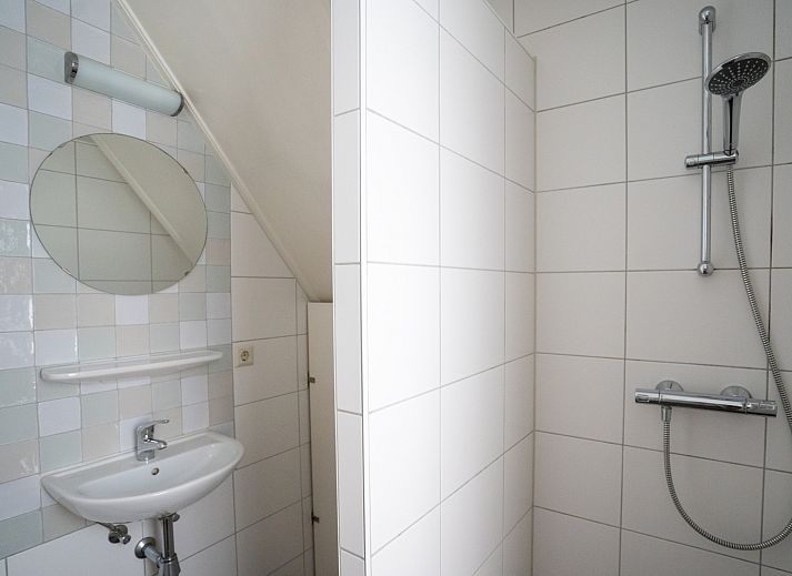 Sunny terrace at Bungalow Het Lam, Den Burg, Texel. Perfect vacation home for a restful stay on the Wadden Islands.