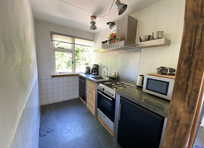 Kogerstraat 98A vakantiehuis in Den Burg, Texel met ruim terras en groene omgeving.