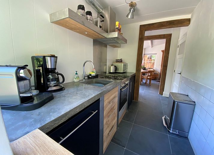 Kogerstraat 98A vakantiehuis in Den Burg, Texel met ruim terras en groene omgeving.