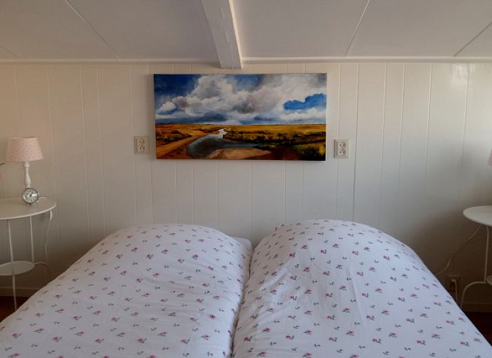 Charmante Terrasse von De Bedstee in Den Burg, Texel. Geniessen Sie die Natur in diesem Ferienhaus auf den Waddeninseln.