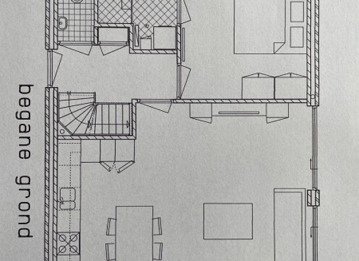 Modern exterior of Villa 3C in Den Burg, Texel, with cozy sitting area on the terrace, ideal vacation home.