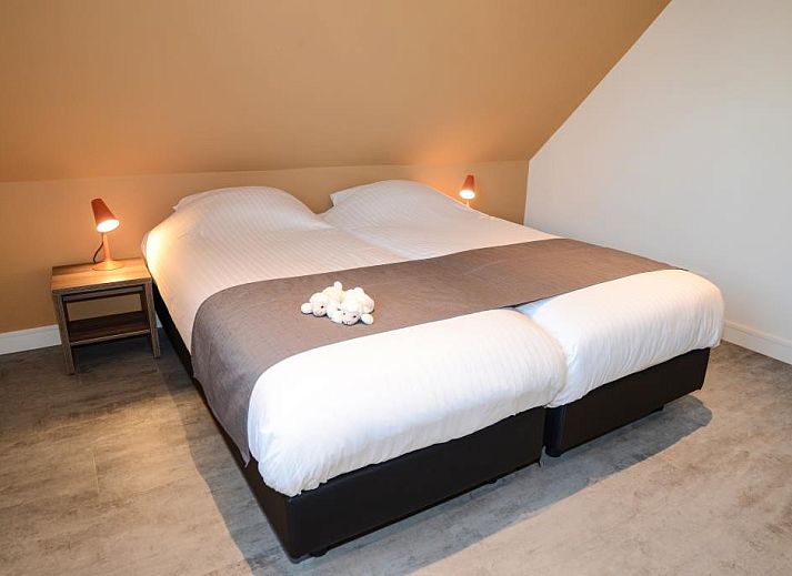 Stijlvolle woonkamer in Roggesloot vakantiehuis, Den Burg, Texel met moderne inrichting.