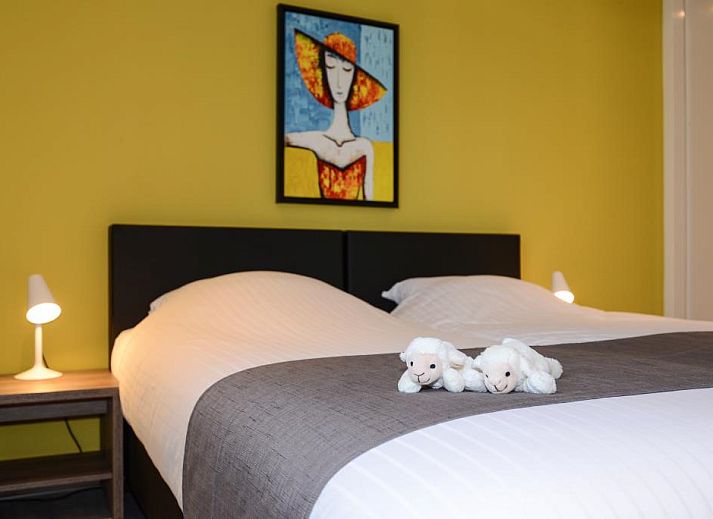 Comfortabele zithoek in Roggesloot vakantiehuis, Den Burg, Texel met open haard.