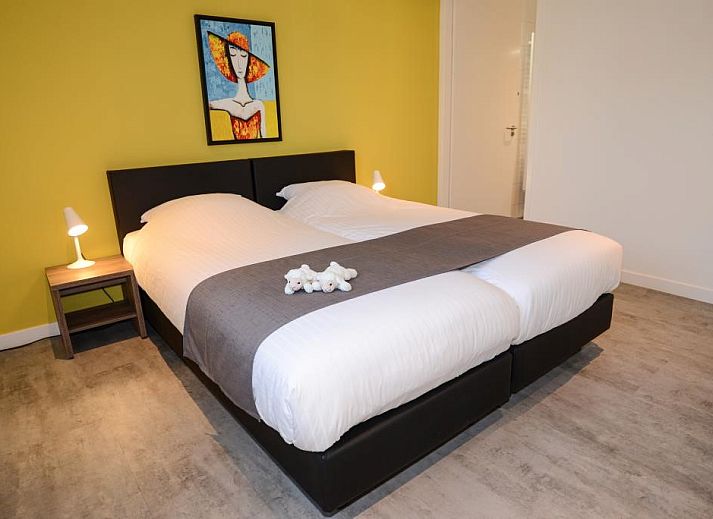 Comfortabele zithoek in Roggesloot vakantiehuis, Den Burg, Texel met open haard.