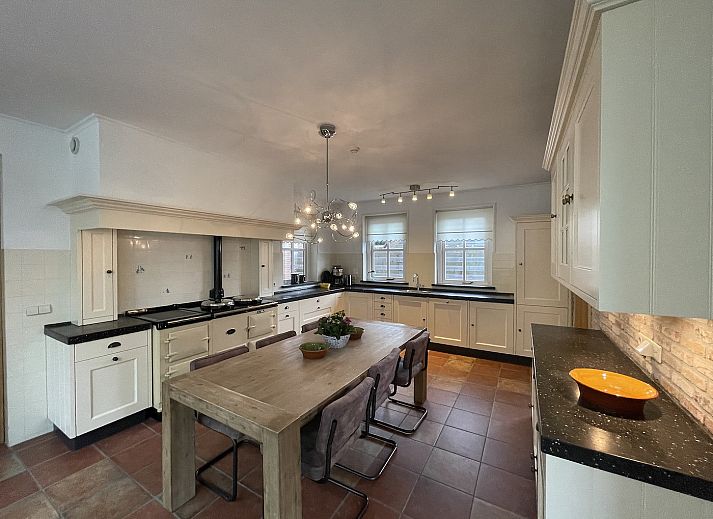 Gezellige woonkamer in 44 - Aldubo Landhuis, Den Burg, Texel, met comfortabele zitplaatsen.