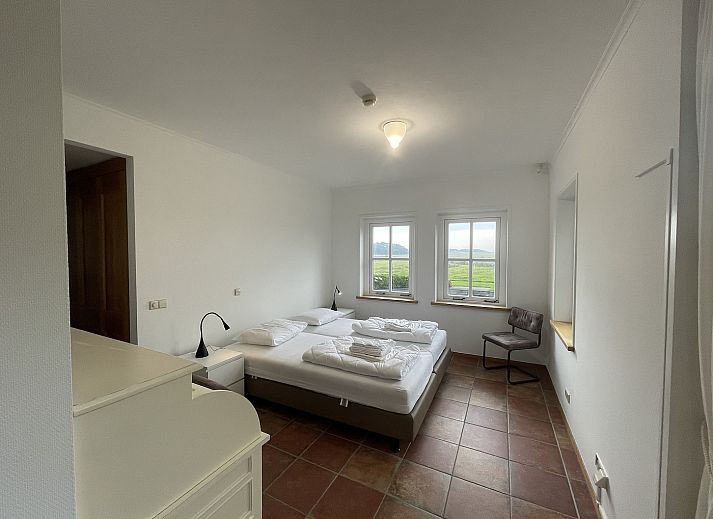 Gezellige woonkamer in 44 - Aldubo Landhuis, Den Burg, Texel, met comfortabele zitplaatsen.