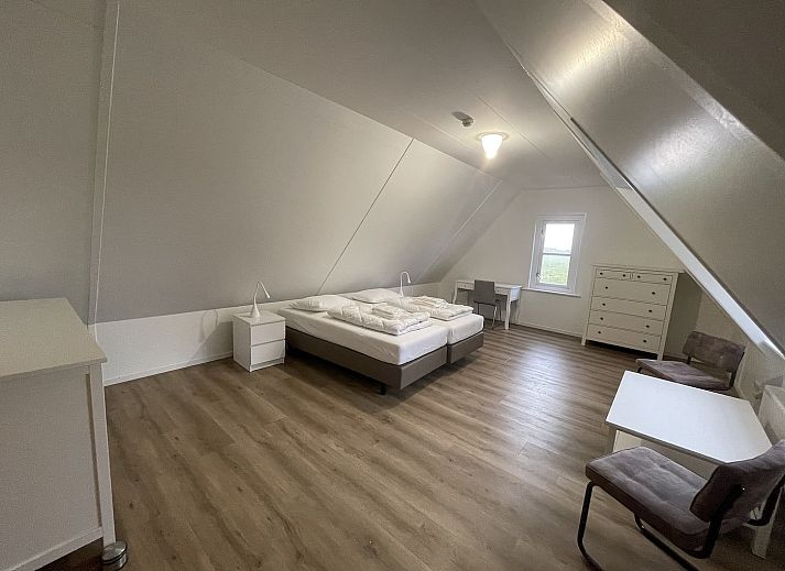 Moderne woonkamer in 44 - Aldubo Landhuis, Den Burg, Texel, met stijlvolle inrichting.