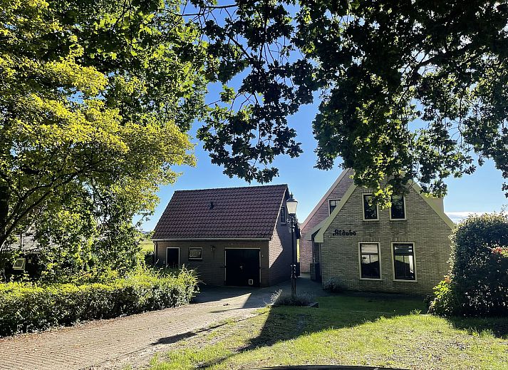 Moderne woonkamer in 44 - Aldubo Landhuis, Den Burg, Texel, met stijlvolle inrichting.