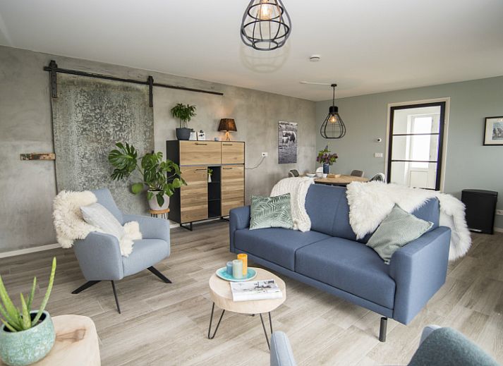 Onder de Wol vakantiehuis in Den Burg, Texel met charmant terras en groene omgeving.