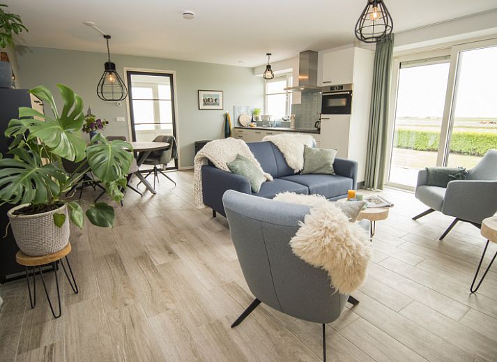 Onder de Wol vakantiehuis in Den Burg, Texel met charmant terras en groene omgeving.