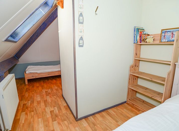 Stijlvolle woonkamer in De Boet vakantiehuis Den Hoorn Texel met comfortabele zithoek.