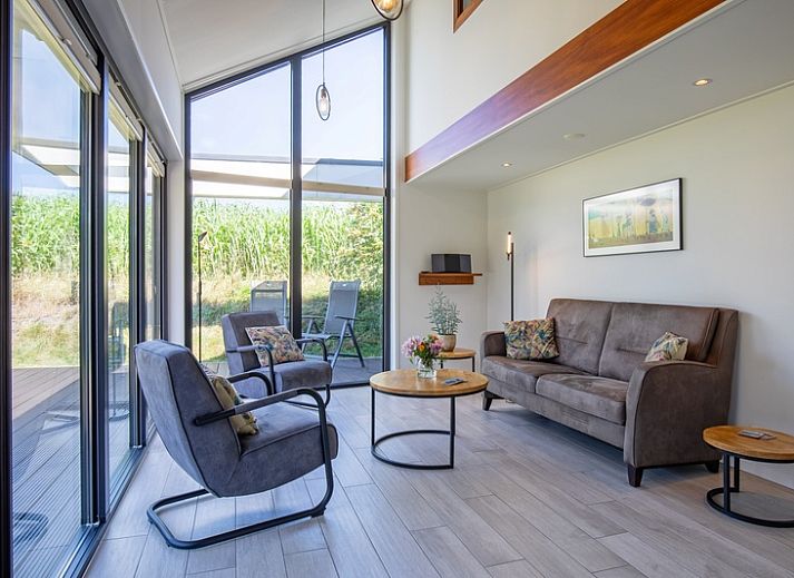 OpTexel vakantiehuis met modern terras in Den Hoorn, Texel. Perfecte plek voor ontspanning op de Waddeneilanden.