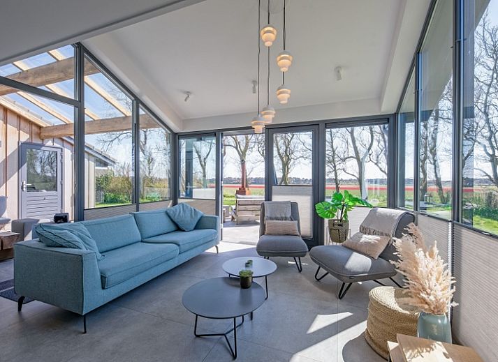 TexelZon vakantiehuis met terras in Den Hoorn, Texel, omgeven door natuur en rust.