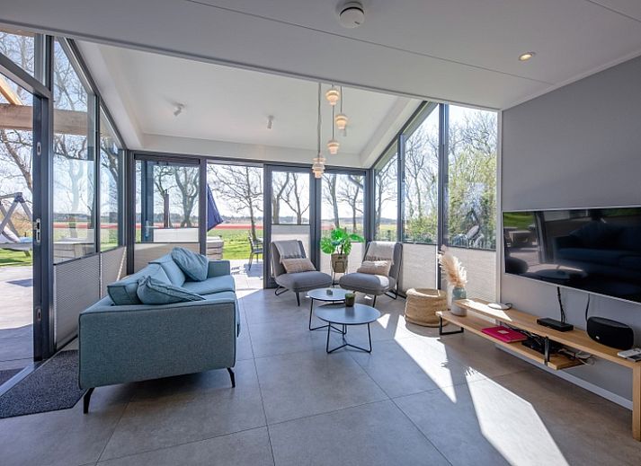 TexelZon vakantiehuis met terras in Den Hoorn, Texel, omgeven door natuur en rust.