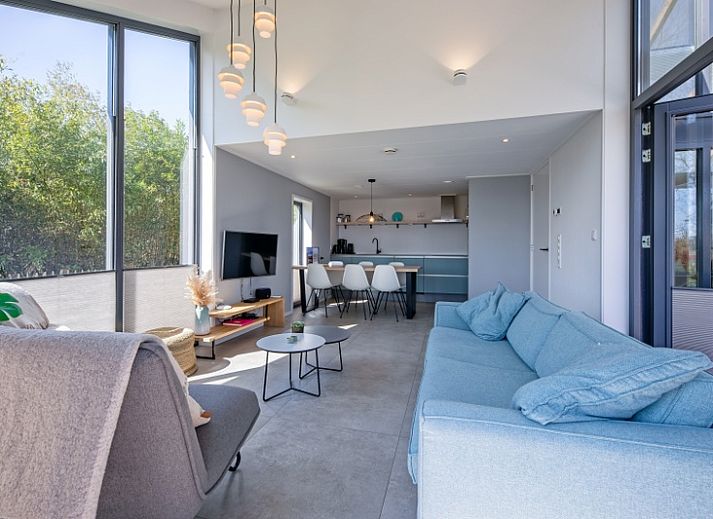 TexelZon vakantiehuis met terras in Den Hoorn, Texel, omgeven door natuur en rust.