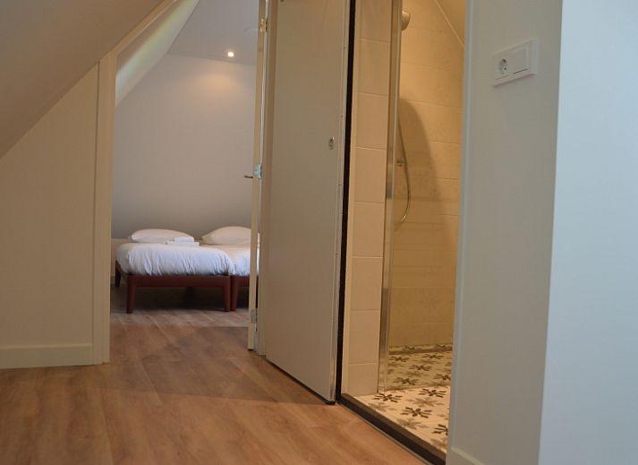 Gemuetliches Wohnzimmer im Ferienhaus 't Wambuis, Den Hoorn, Texel mit Stranddekor.