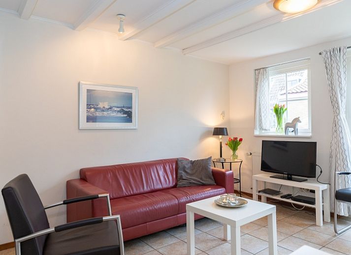 Kaninchenbau-Ferienhaus in Den Hoorn Texel mit charmantem Aeusseren und gruener Umgebung.