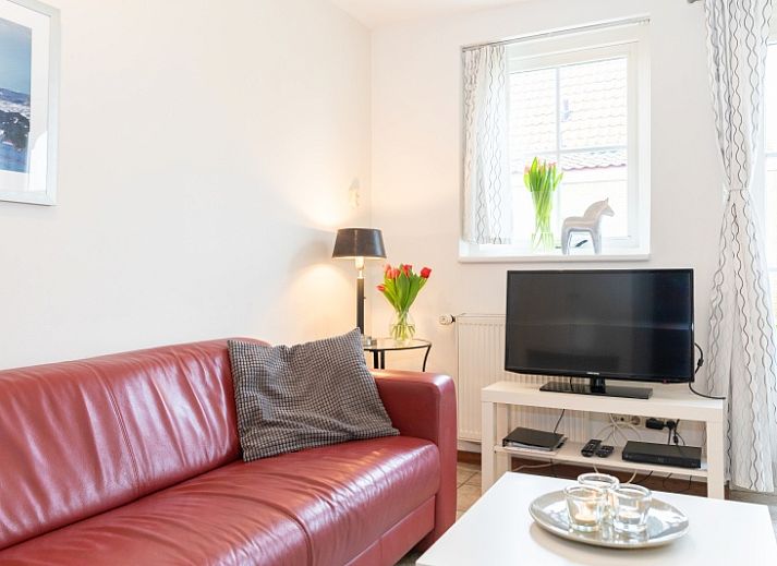 Kaninchenbau-Ferienhaus in Den Hoorn Texel mit charmantem Aeusseren und gruener Umgebung.