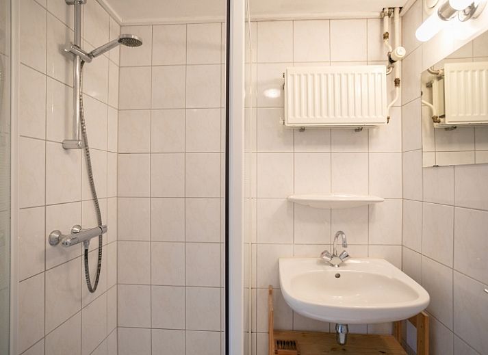 Gemuetliches Wohnzimmer von Rabbit Hole in Den Hoorn Texel mit bequemen Sitzgelegenheiten.