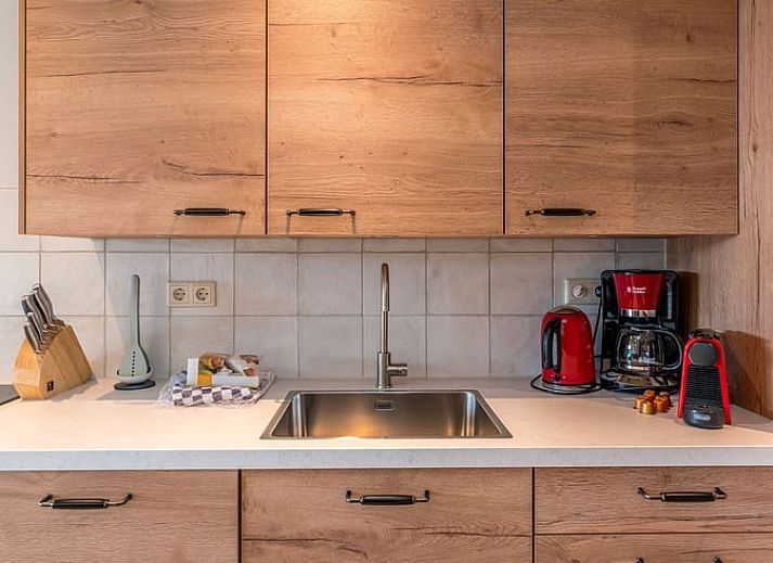 Ferienhaus in Oosterend, Texel, mit grossem Garten und traditioneller Architektur auf den Watteninseln.