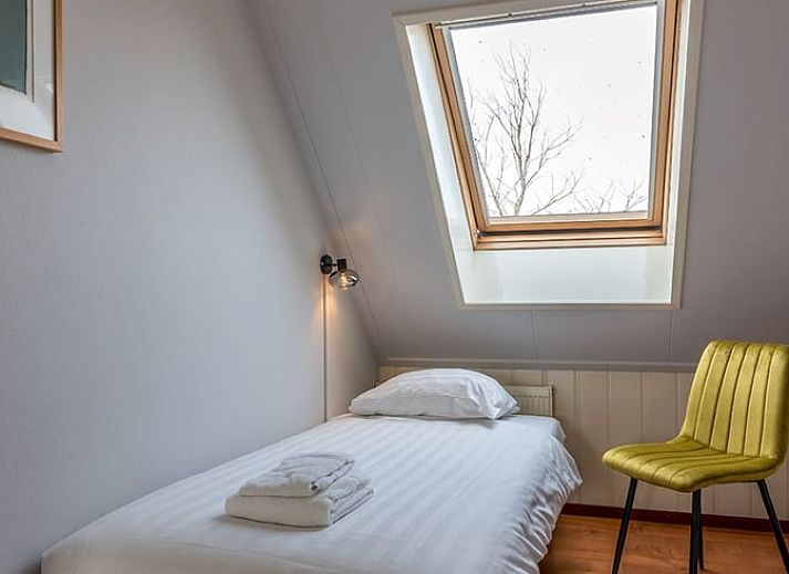 Ferienhaus in Oosterend, Texel, mit grossem Garten und traditioneller Architektur auf den Watteninseln.