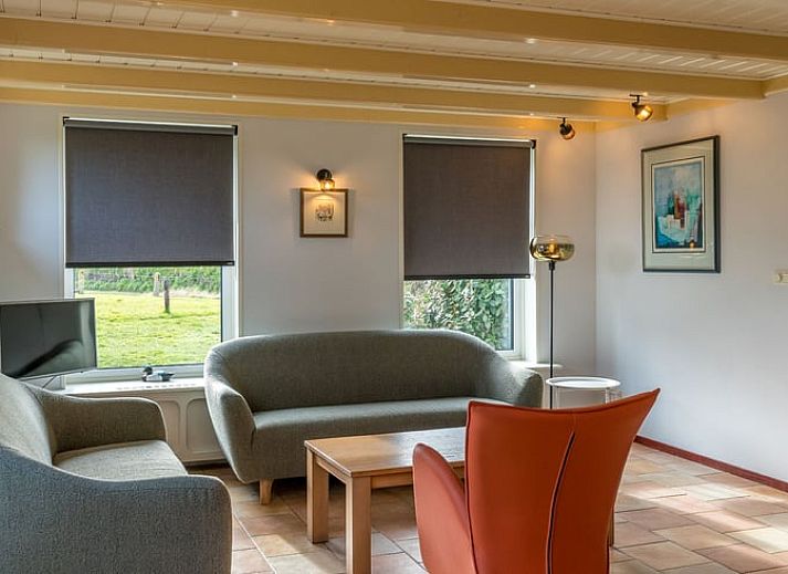 Cozy living room in Holiday home in Oosterend, Texel, with comfortable seating.