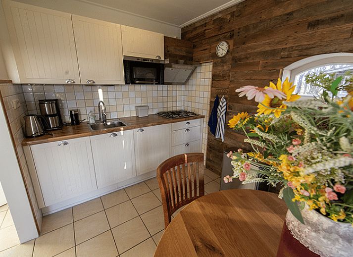Aerial view of Holiday home in Oosterend, Texel. Beautiful view of sea and nature around the vacation home.