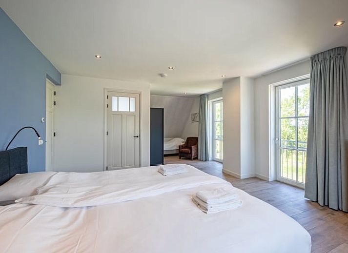 Vakantiehuis in Oosterend, Texel biedt een ruime en uitnodigende leefruimte voor ontspanning.