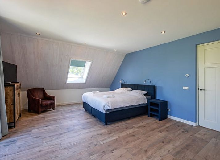 Gezellige zithoek in Vakantiehuis in Oosterend, Texel met een rustgevend interieur.