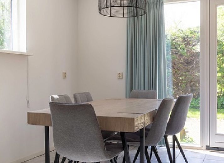 Typ I - Nr. 59 Ferienhaus Mallemok mit Terrasse in Oosterend, Texel, mitten im Gruenen.