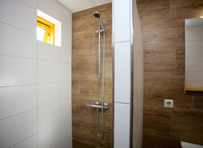 Cozy vacation home Type II - No. 83 Sperwer in Oosterend, Texel, surrounded by nature.