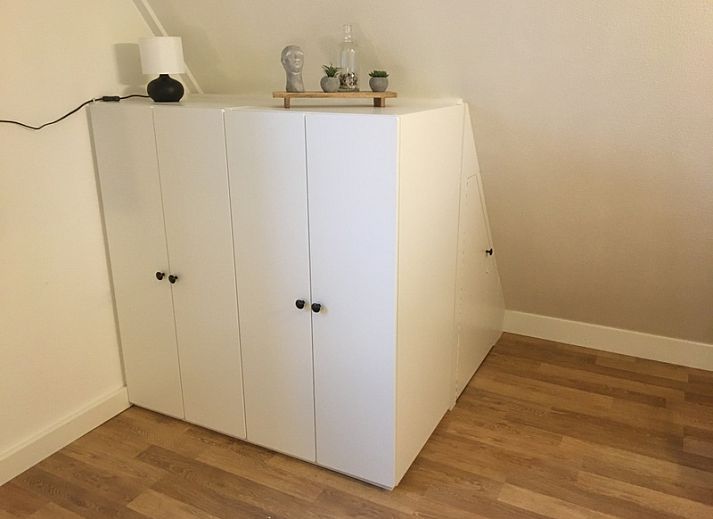 Spacious terrace at Type II - No. 83 Sperwer vacation home in Oosterend, Texel, ideal for outdoor activities.