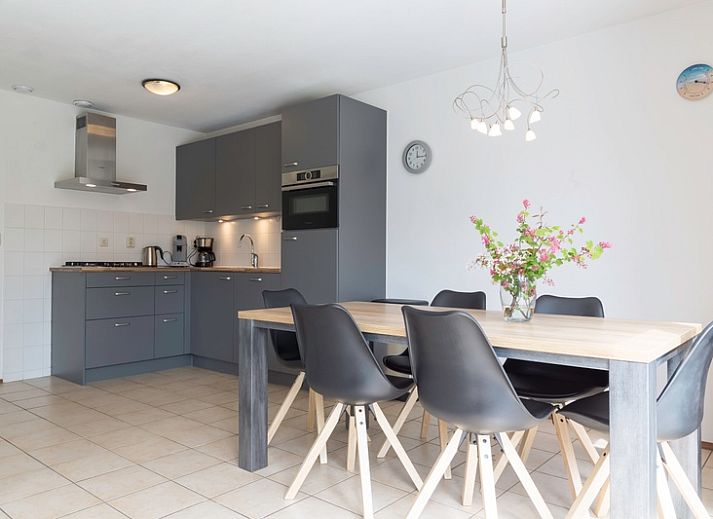 Type I - No. 55 Marel, vacation home in Oosterend Texel with charming facade and red roof tiles, ideal for a relaxing stay on the Wadden Islands.