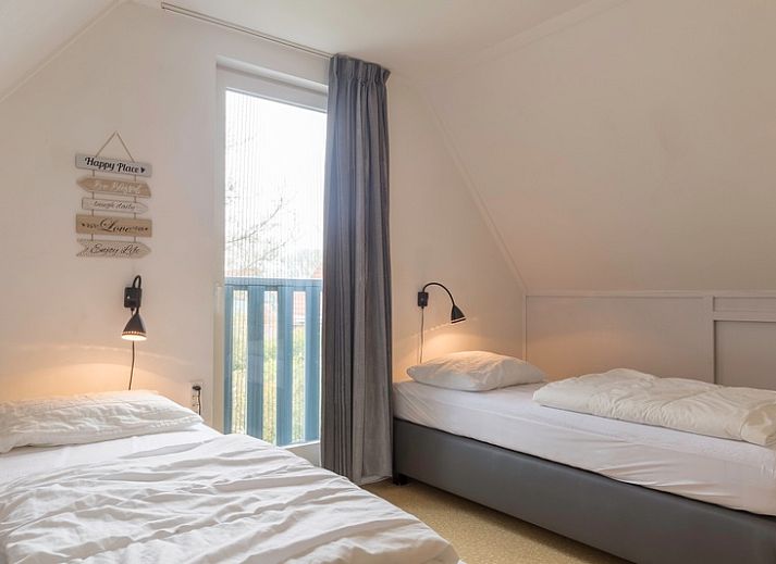 Cozy vacation home Type I - No. 55 Marel in Oosterend Texel, surrounded by greenery, perfect for a quiet vacation on the Wadden Islands.