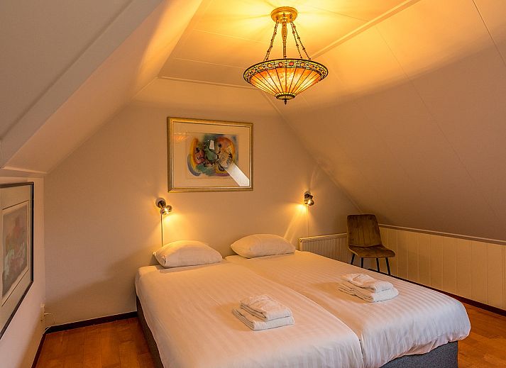 Cozy living room in 13 - Dukaat - allotment, vacation home in Oosterend, Texel, with comfortable seating.