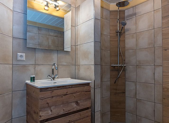 Cozy living room in 13 - Dukaat - allotment, vacation home in Oosterend, Texel, with comfortable seating.