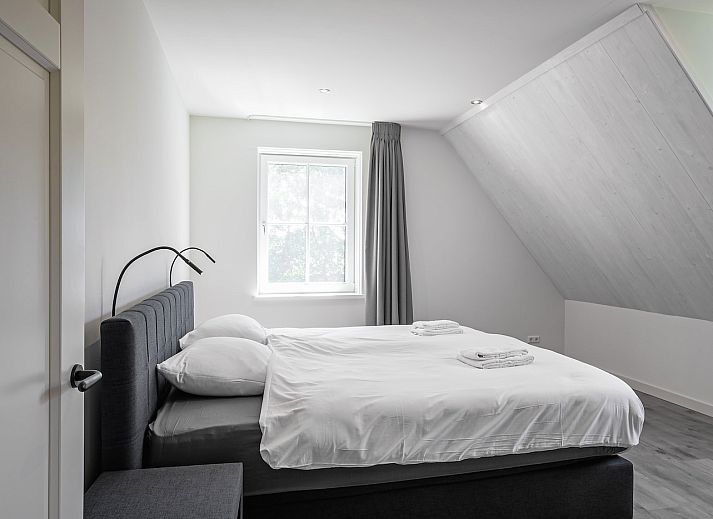 Lichte en ruime woonkamer in vakantiehuis 46 - Nieuw Zeeland, Oosterend, Texel.