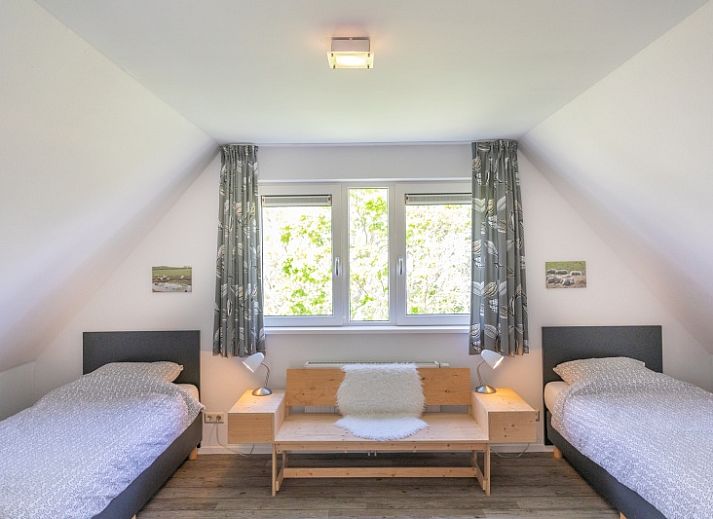 Lucrosa Ferienhaus in Oosterend Texel mit sonniger Terrasse und gruenem Garten.