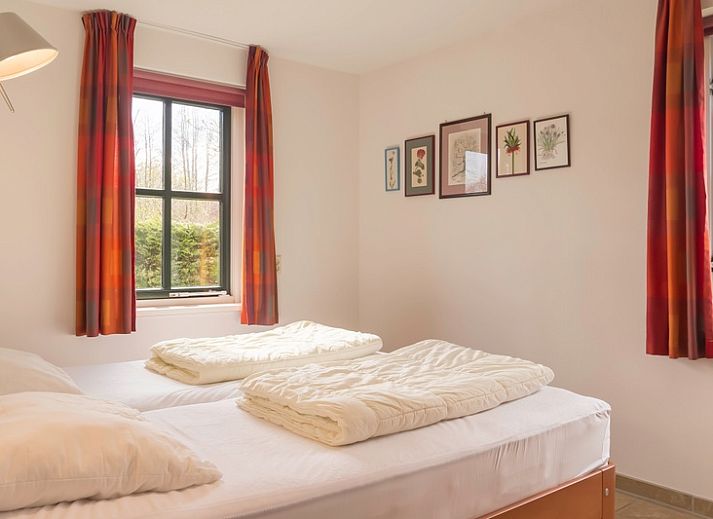 Veranda of Type III - No. 21B Pheasant in Oosterend, Texel with French doors to the terrace.