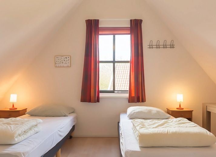 Veranda of Type III - No. 21B Pheasant in Oosterend, Texel with French doors to the terrace.