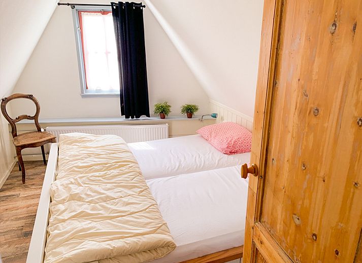 Vissershuisje De Bruinvis in Oudeschild, Texel, een charmant vakantiehuis met authentieke uitstraling op de Waddeneilanden.